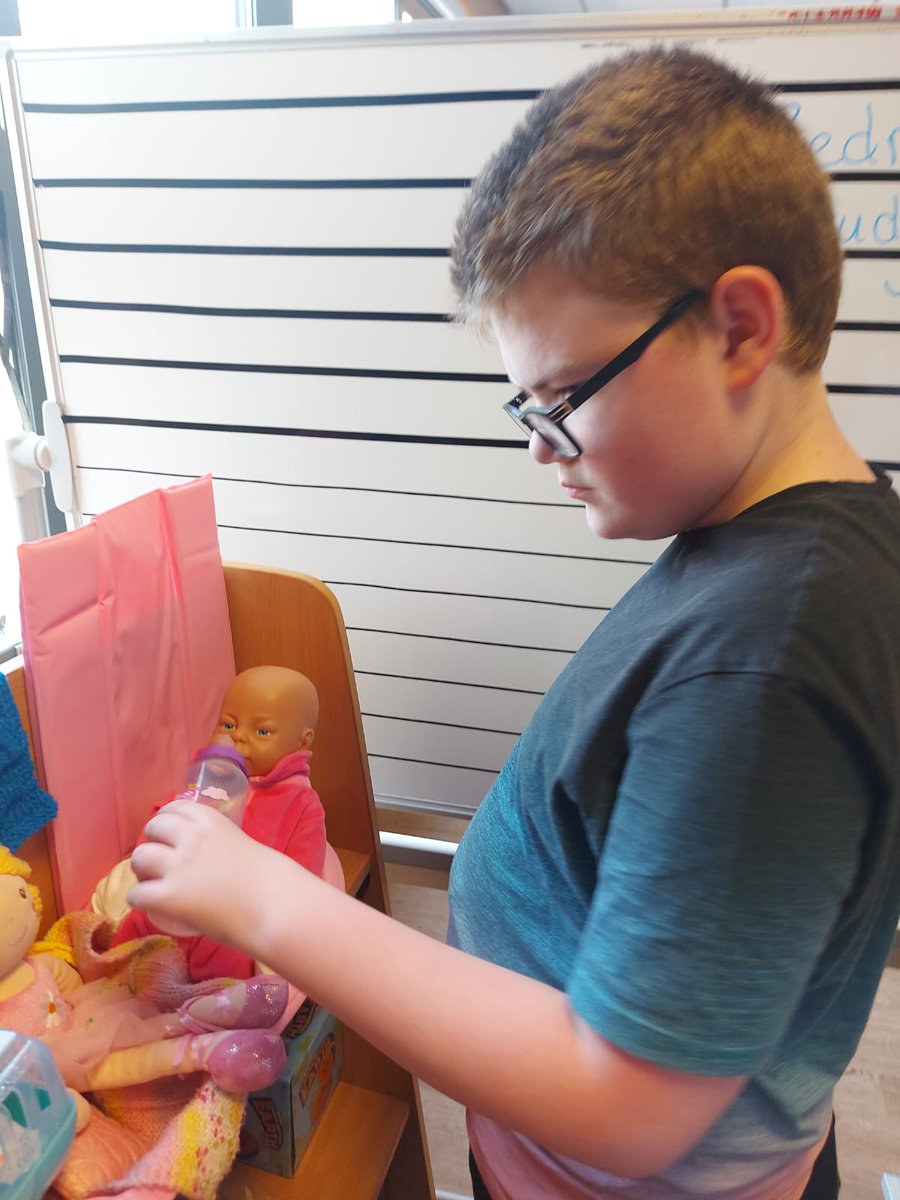Sue's Class working and playing in the enterprise area at Carnbroe. Making cards to introduce ourselves to our new and welcoming community neighbours.