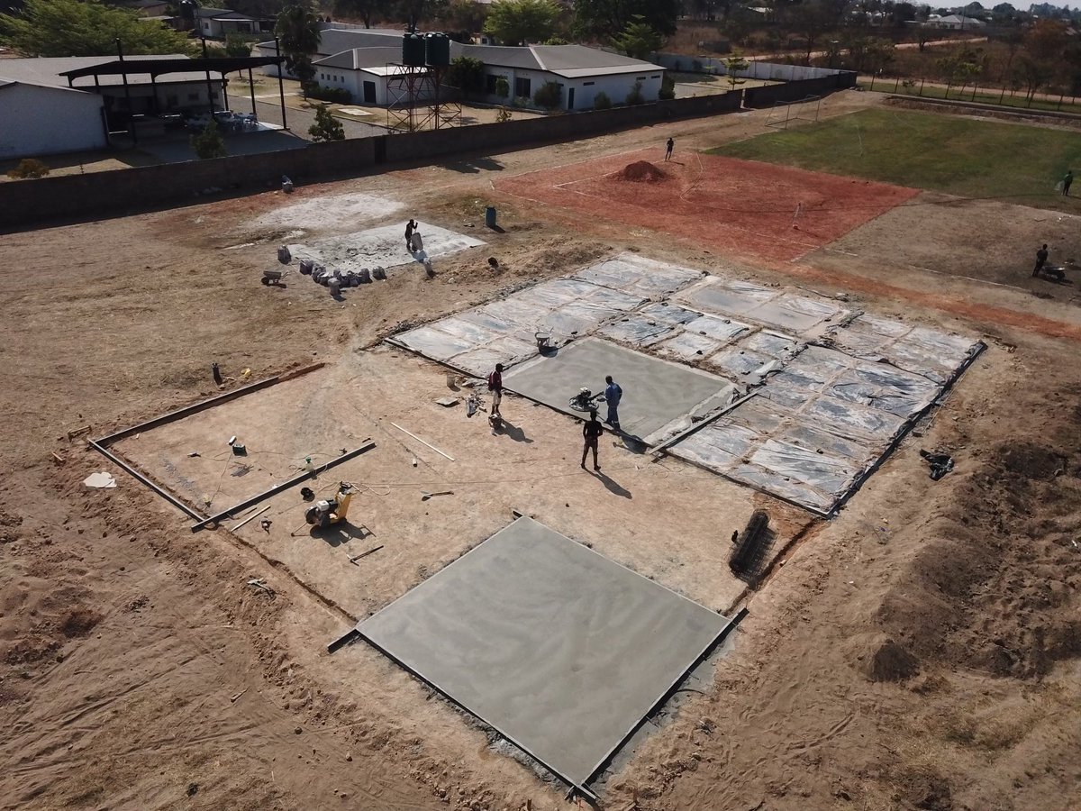PlayBoldOrg's tweet photo. Court pouring has begun over this past week in Zambia! Excited to follow its progress virtually through our amazing partners @PoeticeIntl! https://t.co/LyMCpBWJng