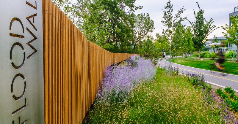 cityofcalgary's tweet image. As you #ExploreDowntownYYC you may notice some changes around Eau Claire with the completion of the 1.39km long Flood Barrier.

Sheet piles, earthen berms, walls &amp;amp; demountable stop log openings all work together to resist a 1:200-year flood event.

Come check it out this weekend.