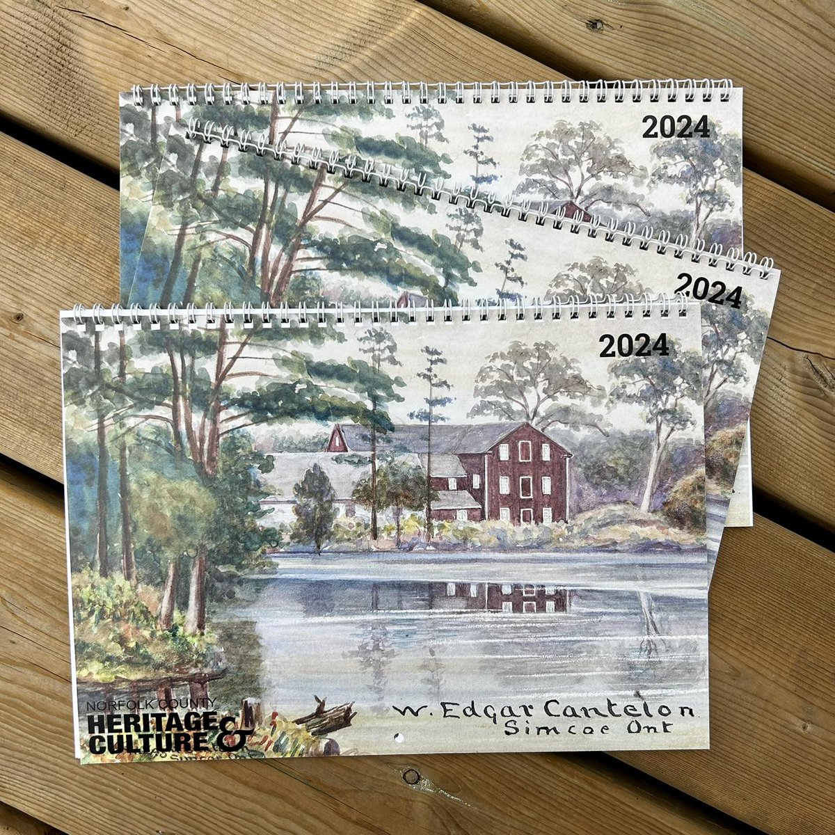 We are so excited to announce that <a href="/NorfolkCulture/">NC Heritage/Culture</a> has produced a 2024 calendar to compliment our county-wide W.E. Cantelon exhibits. Each month features a Cantelon painting depicting historic Norfolk County scenes. On sale for $25 at any <a href="/NorfolkCountyCA/">Norfolk County</a> museum or Archives.