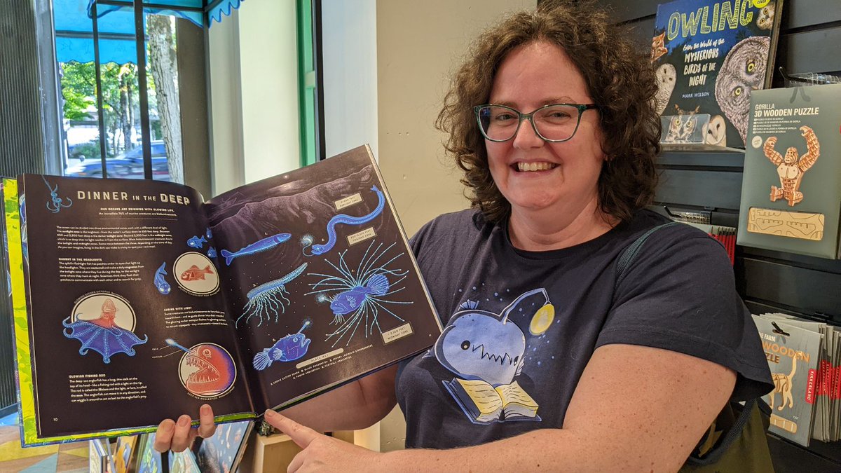 That feeling when you stop by <a href="/kidsbooksca/">Vancouver Kidsbooks</a> and pick up "Glow: The Wild Wonders of Bioluminescence" by @wondertheoryart and realize that your <a href="/TeeTurtleHQ/">TeeTurtle</a> anglerfish shirt matches the book! #librarianchic