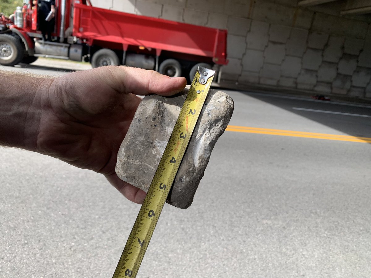 CstTaraso9345's tweet photo. More CMV #Safestart enforcement in Oakville today.
This dumptruck was stopped and inspected by ^MD from @HRPSCMV. These large stones were found resting on the trucks components in the vicinity of the brakes.
Proper pre-trip inspections would help to avoid these dangers. https://t.co/tsS5I2lP2P