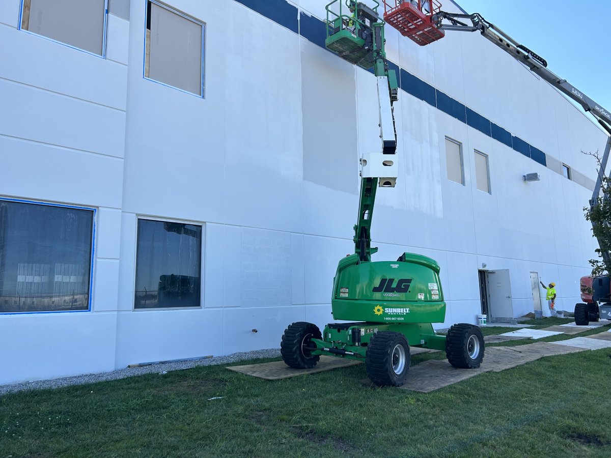 FabconW2E's tweet photo. Ch-ch-changes! Our W2E crews made significant tenant modifications to a building in Newark, NJ, adding dozens of new windows, OH, and pedestrian doors. #ThinkFabcon https://t.co/90nKIAS5H6
