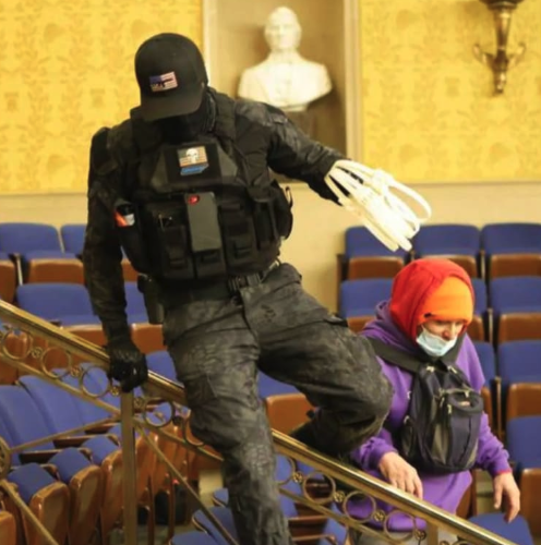 OccupyDemocrats's tweet photo. BREAKING: The most infamous January 6th insurrectionist — the man in tactical gear who was armed with zip ties inside the Capitol — is sentenced alongside his traitor mother to a combined 7.25 years in federal prison.

Eric Gavelek Munchel will serve 4 years and 9 months for his five felony charges, some of which are weapon-related. It's still unclear exactly what he intended to do with his ties, but all of the possible explanations are chilling.

His mother Lisa Marie Eisenhart will serve 2.5 years after being found guilty of conspiracy to commit obstruction and obstruction of an official proceeding. She also brought a taser with her, proving that she intended to fight.

Pathetically, she whined that prison time would hurt her career in healthcare. Why anyone would want a deranged traitor tending to them is anyone's guess.

This is justice. This is what happens to those who try to destroy American democracy. Good riddance.

Please retweet and ❤️ to thank the judge — and consider joining the growing exodus to Tribel, a “woke” new Twitter competitor that banned Trump for life and is exploding in popularity because Elon Musk banned Tribel’s Twitter account — but he forgot to ban this link to download the new Tribe app: https://t.co/HnJzSKjCwX