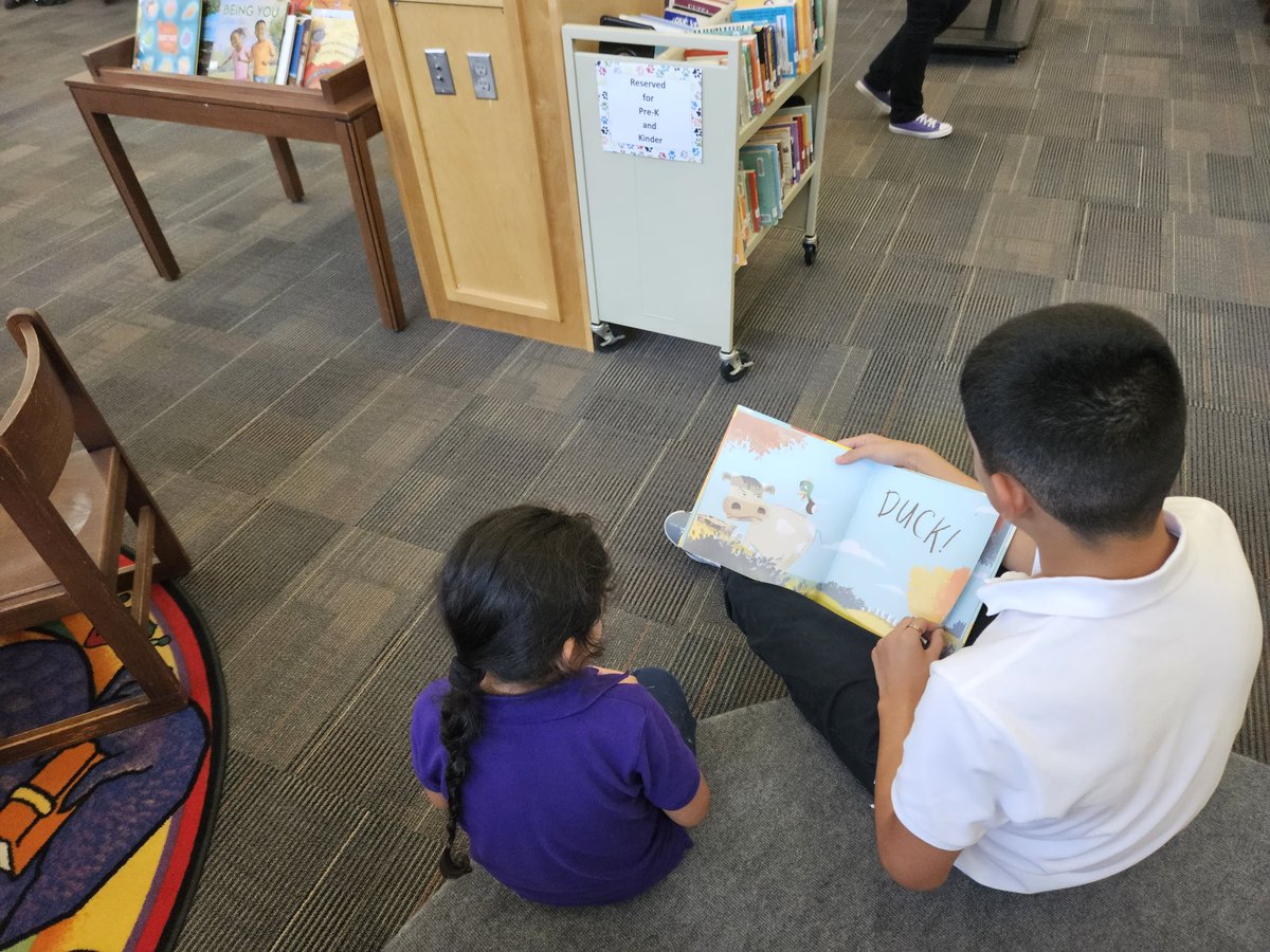 Today is #InternationalLiteracyDay. 8th grade Bulldogs are buddy reading with the PreK Lil Paws.@JPStarksMST @DISD_Libraries @DHLibraryStax @shannontrejo @dwainsimmons
