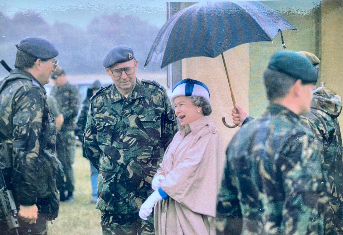 Sgt P Barry receiving his Queens Medal Champion Shot of the Air Forces from HM Queen Elizabeth II in 1993 in rather damp conditions