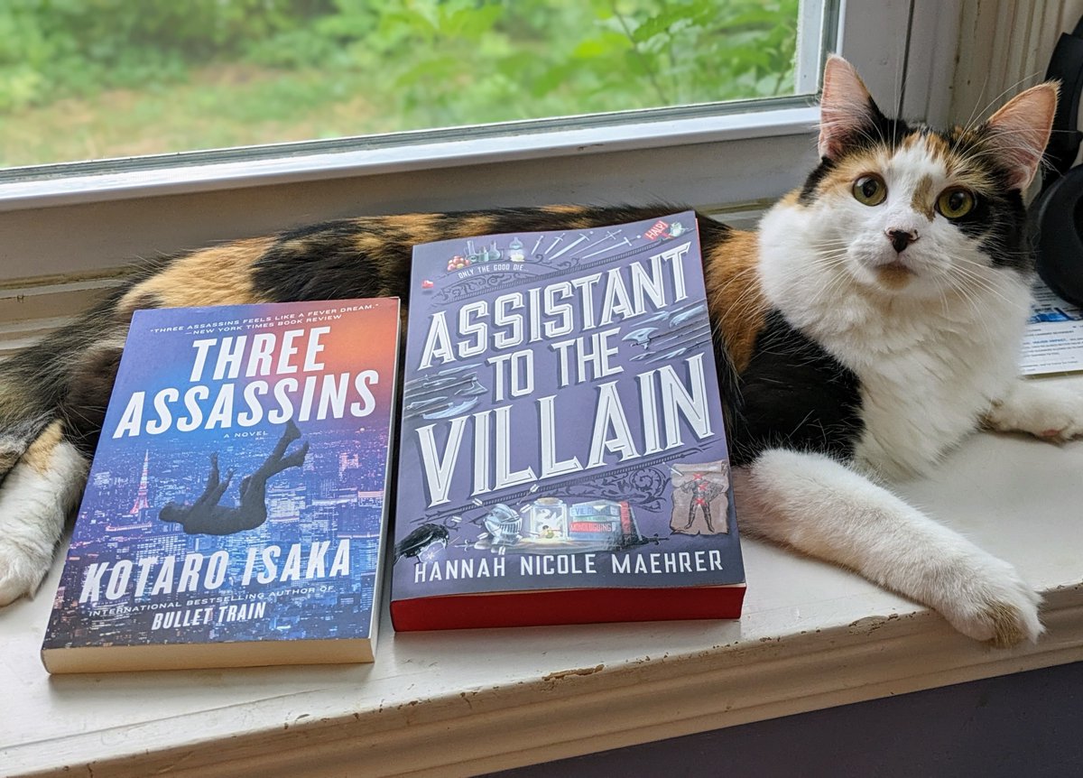 What a couple of great finds today! #ThreeAssassins by Kotaro Isaka, author of #BulletTrain, which is awesome and hilarious. #AssistantToTheVillain by Hannah Nicole Maehrer, which is a #romantasy that also looks hilarious and awesome! Love the red edges! #CatsOfTwitter