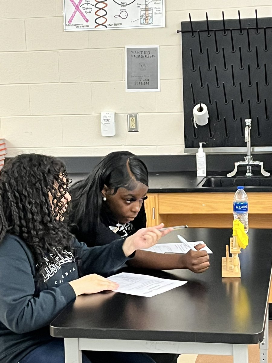 Students learning about yeast and carbon monoxide emissions in class today during 1st period at Huguenot.