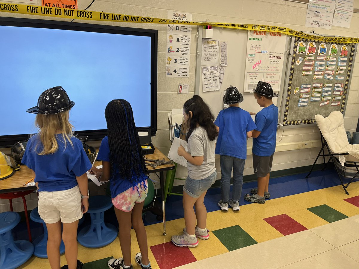 LavalleesClass's tweet photo. Firefighter place value review was a huge success! After they were done they got to try on the gear https://t.co/QpTPWmchY9