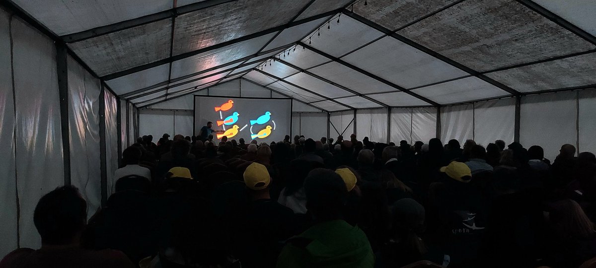 If anyone can make moult entertaining, it's the estimable Mr @StephenMenzie - great, engaging talk about a potentially dry subject... #Migfest going great, top work @spurnbirdobs!