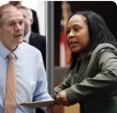 This is INTENTIONAL.  they are making Fanni Willis look like she is stabbing Jim Jordan in the gut. These are two separate photos, with no weapons involved.