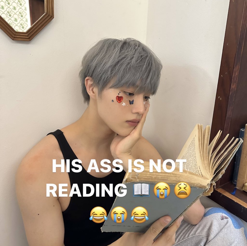 cixreactionvids's tweet photo. submission his ass is not reading hyunsuk holding book https://t.co/n0OX0RSmKy