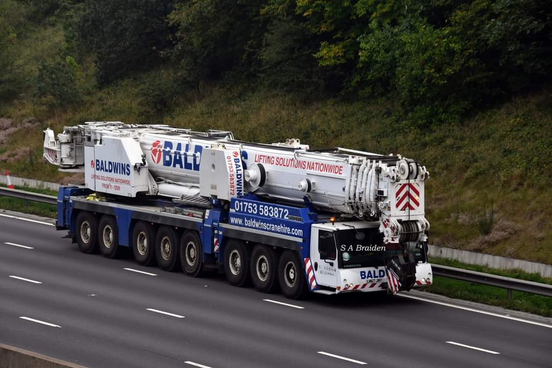 Baldwins crane hire <a href="/Liebherr_GB/">Liebherr GB</a> 1450 making its way south along the M6 through Staffordshire