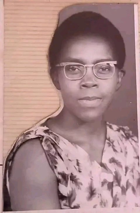 Thriving_luos's tweet photo. ALICE BELDINA ANYANGO;
KA NYAKO OSOMO GIMABER AHINYA.

In the early 70s.. around 1972, an amazing song in honor of a great lady, was released by Continental Kilo(CK) Jazz Band; "Kilo rahuma.." which was then led by George Ramogi;
 (Omogi Madiaba omin Akumu wuod Weta Kamwala).

The song would later become instrumental in sensitizing the community about the need to empower girl child just like the boy child.

Composed by Peter Auma Kabwere Jamawego, the song  titled "Alice B Anyango" was done in honor of the lady whose photo has been attached here. When Mr Wilson Were , a Benga fan, got an opportunity to talk to Mr Ben Opondo(Rasto) who's her only brother, it came out that the lady was born in 1939 at Konyango sub-location, Rachuonyo North sub-county in Homabay county.

Born to Mzee Emmanuel Owuor Obuya and mama Silpa Osano, she was named Alice Belsheba Anyango. Others also knew her as Alice Beldina Anyango. 

Alice schooled at Kamagambo where she wrote her highschool exams before proceeding to Mombasa for her P 1 Teaching course. Upon completing the course, she was first posted to Wagwe primary school, before being transferred to a school near her matrimonial home in Kochia. She later secured an employment at the Nigerian High Commission where she worked for 27 years.

With exquisite lyrics and carefully chosen words, the artiste praises Alice as a combination of beauty, brilliance and determination. Unlike most of our current musicians who sexualize ladies in the name of praising them, the musician here focuses more on Alice Anyango's values and capabilities. Released at a time when some people still didn't see the importance of taking girls to school, the song became an instant hit with its catchy chorus "Kanyako osomo gima ber ahinya" taking the airwaves by a storm.

And as if trying to debunk a notion held by some people then, that it's only a boy who was capable of uplifting the status of his family, Peter Jamawego, expresses his admiration towards some of the great strives Alice was making to uplift the status of her family. This includes "a beautiful home"  that she "built"  for her parents which "shone" so brightly that it could be seen from as far as Suna Migori, Mbita, Maseno or Nyabondo! Must have been a magnificent home, right? 
"E dalau Nya Kendu Anyango owada gima itimo ji opako!"
"Dalau Anyango nyadundo rieny owada katichung' Mbita..
Rieny owada katichung' Maseno..
Anyango owada katichung' Nyabondo..
Rieny owada katichung' Suna.."

Now on the shining of dalagi Anyango.. the meaning and reason why dalagi nene rieny gi kuonde ang'wen, this is how she built the home as explained below;

This was so because Anyango was the first born and she had 4 siblings and all these four siblings she educated them; one was a teacher in Mbita, another was a teacher in Maseno, another one a nurse at Nyabondo Mission Hospital and another one an accountant in Suna.
So if you went to all these four places, the work of Anyango was shining.. products from Anyango's home was shining.. hence dalau Anyango nyadundo rieny owada katichung' Suna, Mbita, Maseno, Nyabondo..
That is how Anyango nene "ogero dalagi.." 

This is a song whose potent message has continued to inspire and motivate our ladies to pursue their goals in life. During the Africities summit in Kisumu, governor Professor Anyang' Nyong'o sang a rendition of the song to the amusement of those in attendance. That only shows that a great song with beautiful lyrics will always stand the test of time. 

This song will forever be a hit which is worth listening to in the presence of a daughter, a sister, a niece, an aunt and any other female relative and/or friend. Even though Alice B Anyango passed on around 2021, our airwaves will continue reverberating with the beats of this great song which was done in her honor! Jodalawa, mae en wer makata owero mana nyari, nyaminu, mamau kata watni moro amora ma nyako to wiyi oknyal kuot winjo kata de in mana kod osiepeni ubudho.