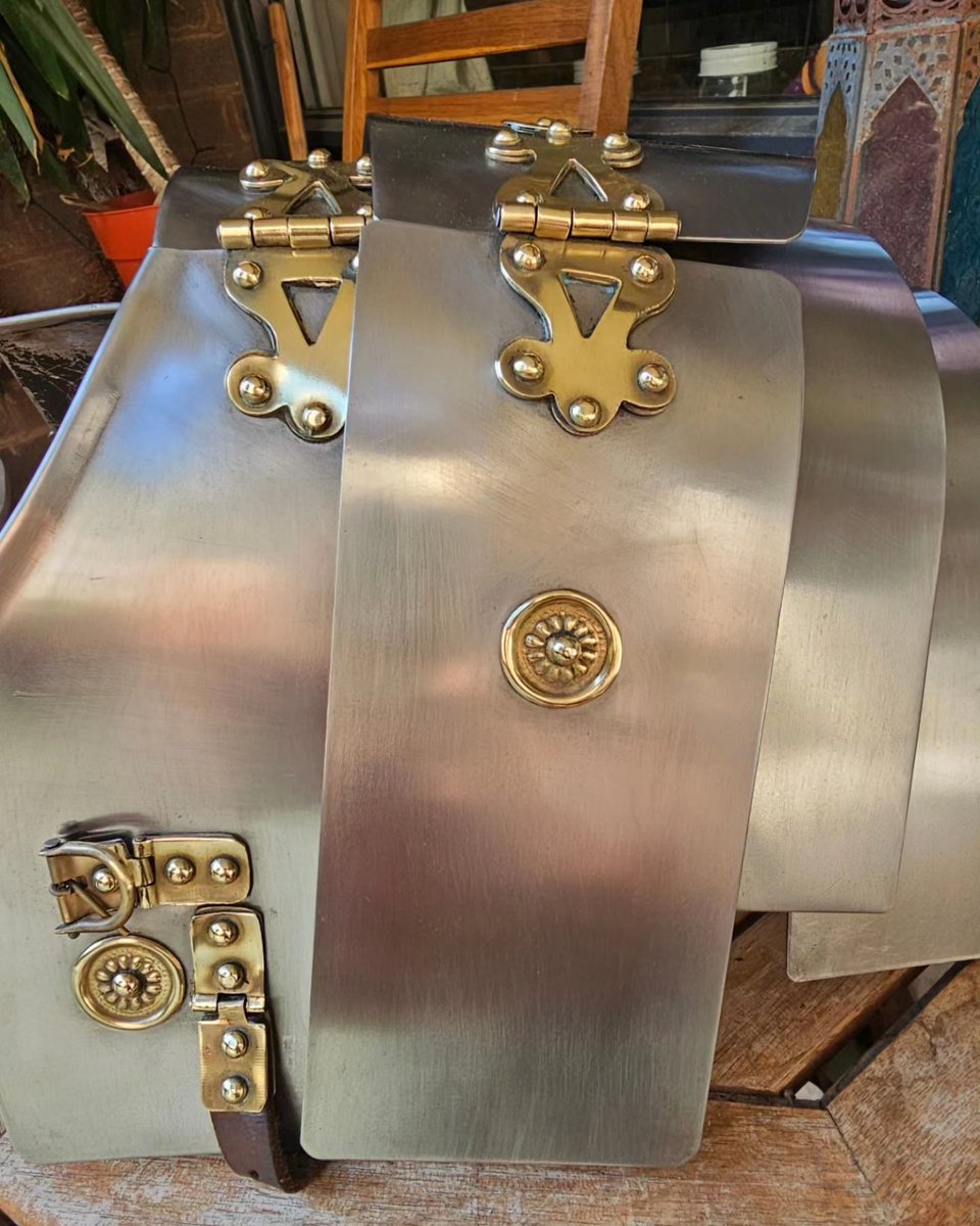 ancientblogger's tweet photo. Spent the afternoon cleaning a section of my lorica segmentata . Had a watchful eye ensuring I didn't miss anything. #ancientrome #loricasegmentata https://t.co/ONT5MXMbD1