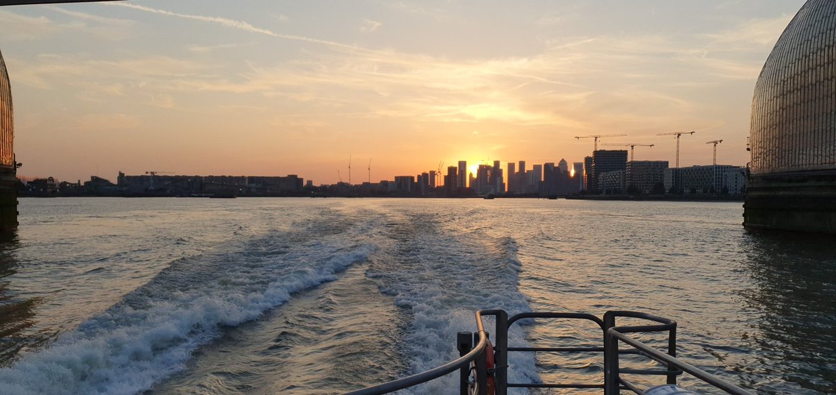 As the sun dips low o'er Thames' gentle flow, A tranquil scene from the clipper's bow. Its golden rays, a painter's delight, Dancing on water, a mesmerizing sight. The river's embrace, a shimmering embrace, Reflects the heavens with elegance and grace.