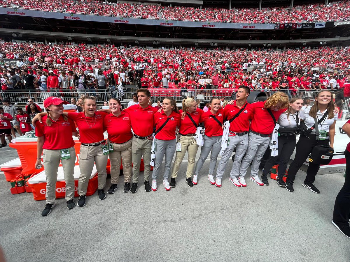 It’s a @OhioStAthletics game day and students assigned to @OSUAthTraining staff with football, cheer, and band stopped for a pre game pic. Go Bucks!