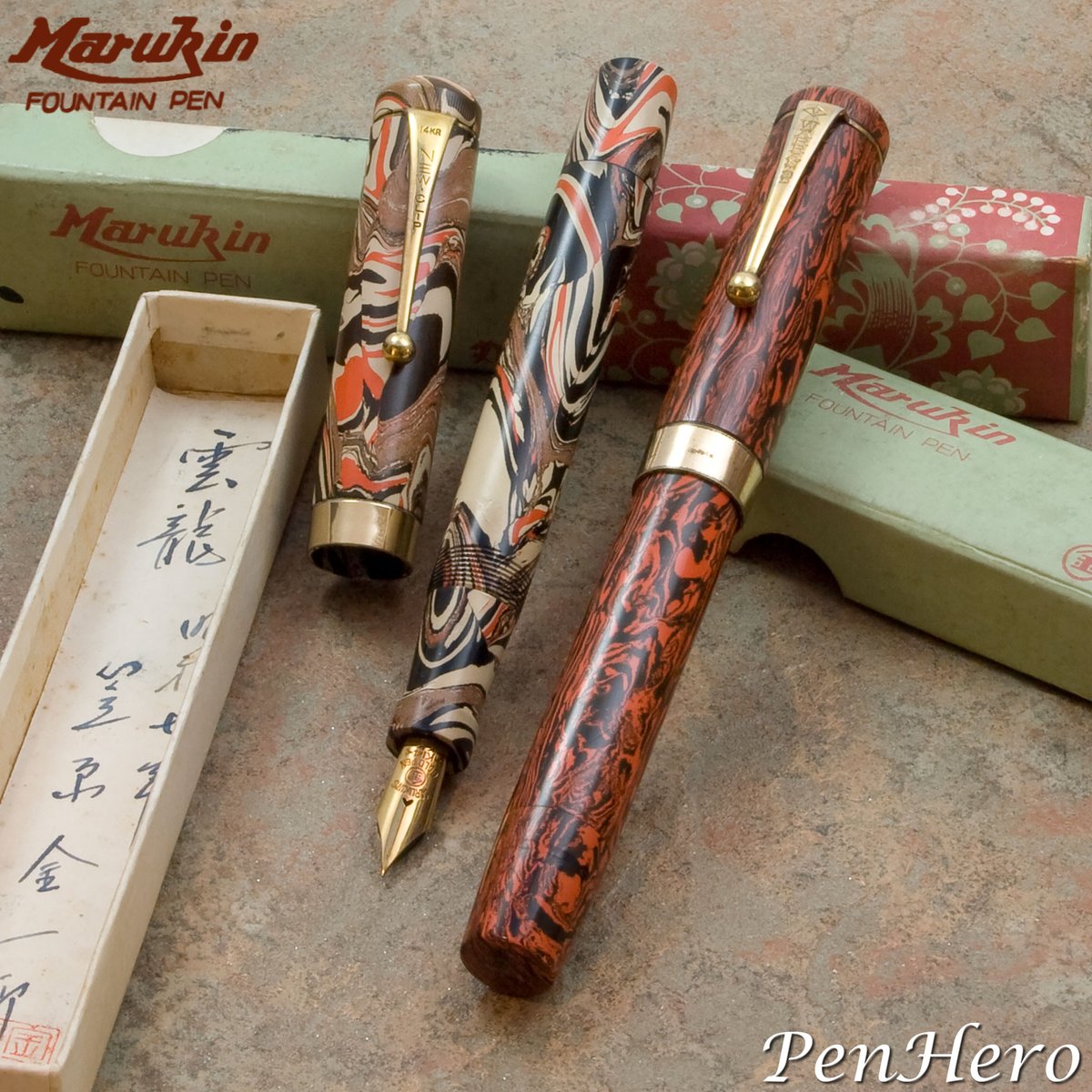 PenHero's tweet photo. These are two Marukin hard rubber shut-off valve eye-dropper filler fountain pens.  Marukin was a maker of high-end fountain pens in the 1930s.  

#pencollecting #fountainpen #marukin #hardrubber  #ebonite  #eyedropper  #penhero https://t.co/Cs4oO9zQL5