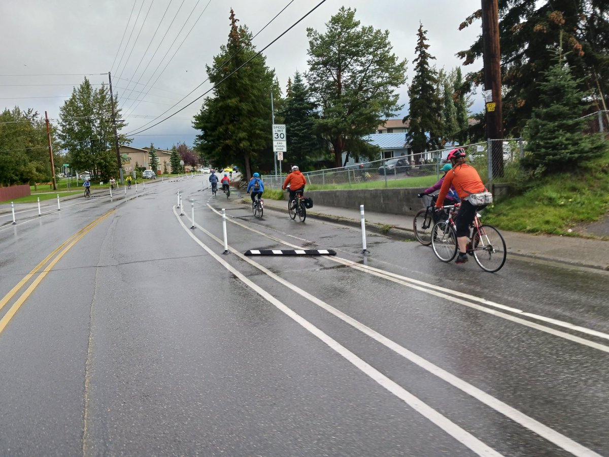 Thanks to everyone who joined the ribbon cutting ceremony on Pine/McCarrey Street--and thanks to the rain for stopping just before! This temporary pilot project helps demonstrate the feasibility &amp; support for protected bike lanes across Anchorage. Good things are on the horizon!