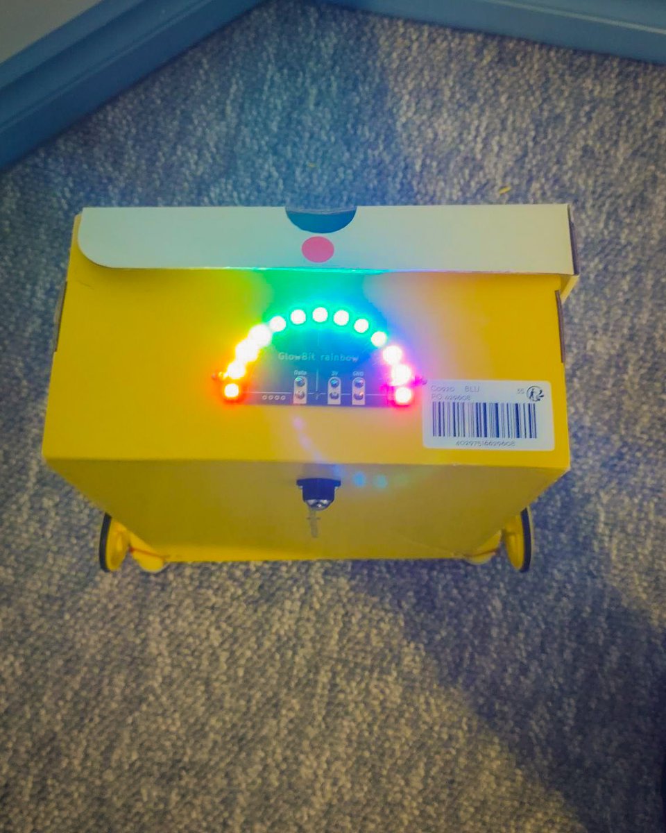 CoreElecAU's tweet photo. This #Micro:Bit Car from Alexander uses a box for a chassis with servos to give the car the beans. Along with a #GlowBit rainbow for some colourful #blinkies while you drive. Read the project and turn your next Core Electronics order box into a vehicle! https://t.co/Pki9c4dIkG https://t.co/XBRB2Rfqy5