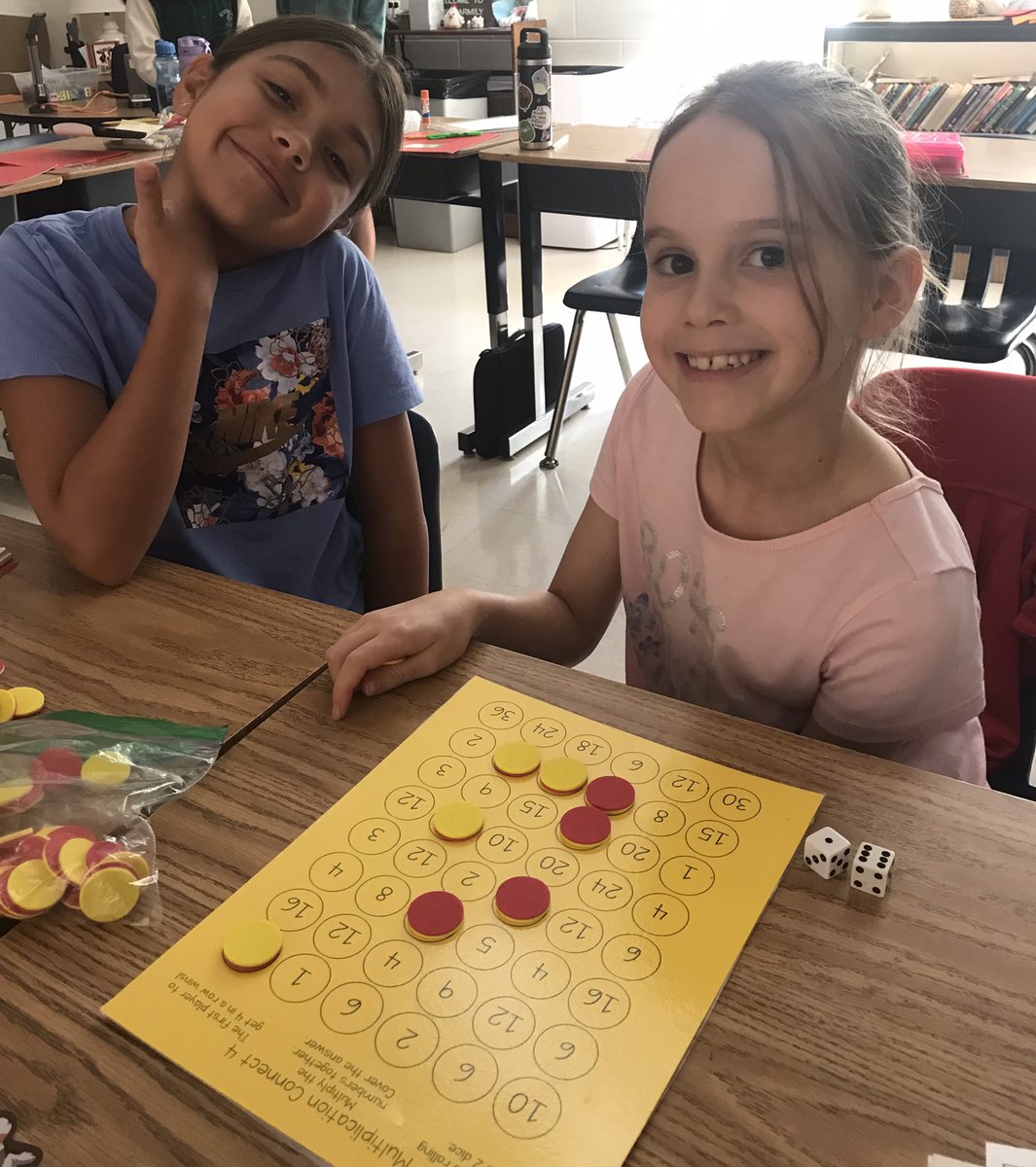 Mathematicians worked with a buddy to learn how to play Connect Four- multiplication edition.