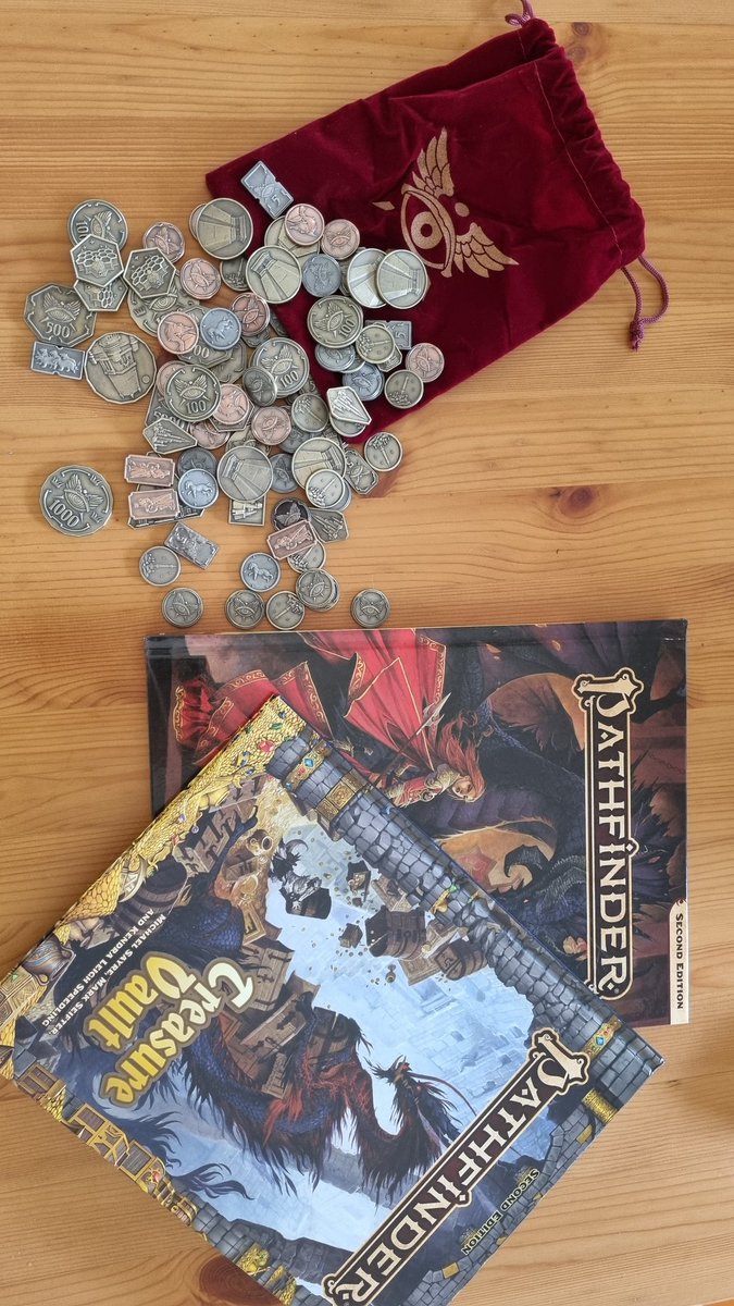 It's been a good week for Pathfinder loot! Got a delivery of Absalom coins from <a href="/CampaignCoins/">Campaign Coins</a> and my print copies of Gamemastery Guide and Treasure Vault from @ImaginaryAdvAus. Love our Aussie distributors!