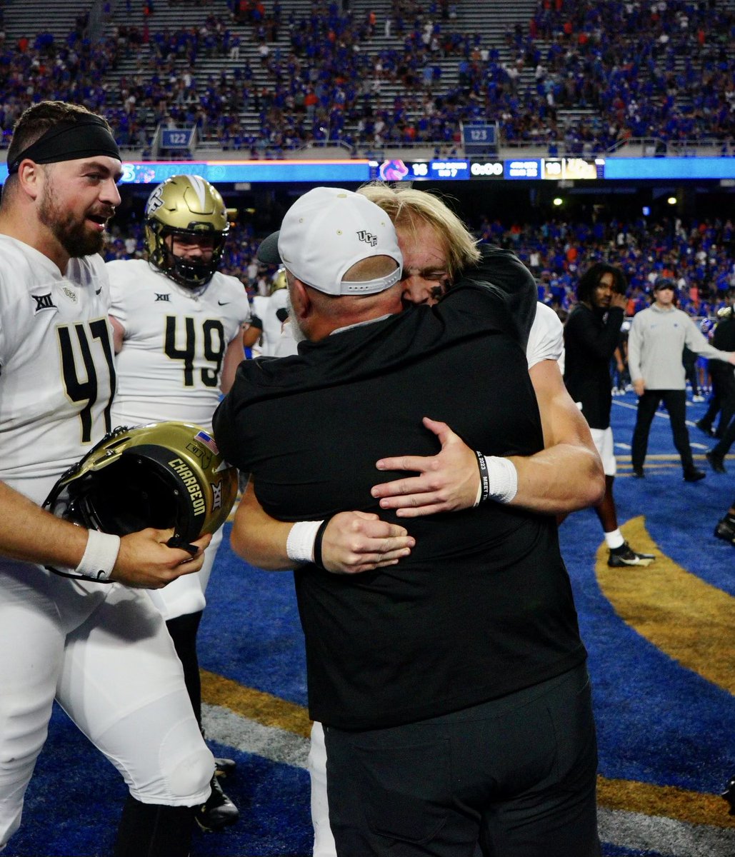 Samboomer1's tweet photo. There is an image that touched me so much this evening - I want to share.  @BenLarsonUCF saw Colton kick @UCF_Football kicking camp 2 years ago and believed in him.  Thank you for all you do Coach Larson. https://t.co/mCubG1r3tA