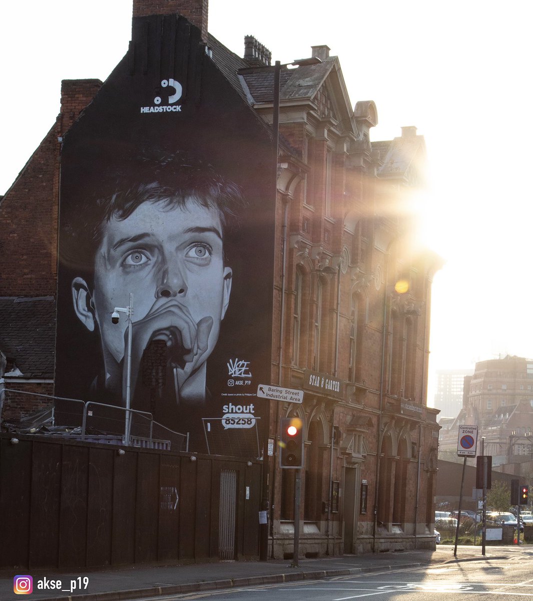 My mural of Ian Curtis based on the original photo by Philippe Carly <a href="/carlyph65747644/">carly philippe</a> has finally been reinstalled on time for World Suicide Prevention Day 2023, A big thanks to <a href="/HeadstockUK/">Headstock</a>   <a href="/OfficialAitch/">Aitch</a> <a href="/depotmayfield/">depotmayfield</a> <a href="/Starandgar23031/">StarAndGarter Manchester</a> <a href="/ManCityCouncil/">Manchester City Council</a> for their support 🙏