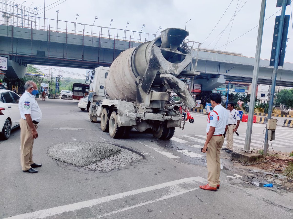 Rectifying the pot holes at biodiversity junction by Raidurgam Traffic Police.