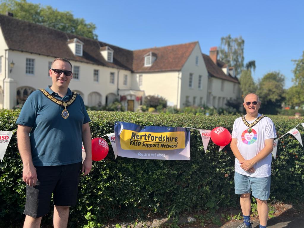 EastFasd's tweet photo. Martin Butcher chair of @EastHerts &amp; Tom Day Mayor of Ware celebrate #FASD day @WareTownCouncil lights the Priory red in solidarity with those living with Foetal Alcohol Spectrum Disorder, the most common neurodisability. @NationalFASD https://t.co/GBwip6QYyS