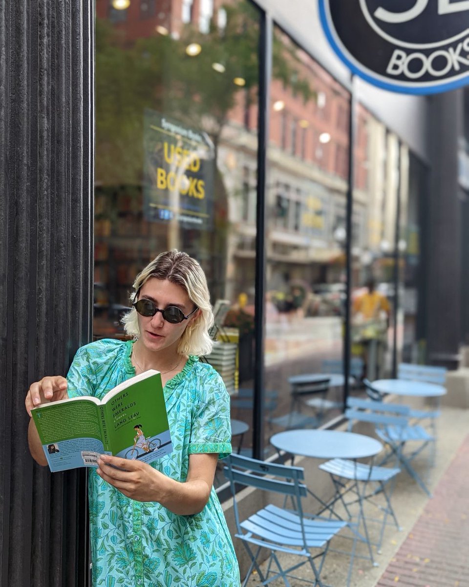 Anastasia enjoying @langleav Lang Leav’s new novel Others Were Emeralds @SymposiumBooks @HarperPerennial #langleav #newnovel #fiction #newrelease #bookstore #providence @indowncitypvd