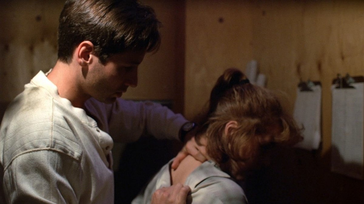 EW's tweet photo. High on the list of @TheXFiles' lasting legacies is the relationship between Agents Fox Mulder and Dana Scully, the believer and skeptic whose razor-sharp rapport introduced us to the concept of shipping. 

Here are 17 of their best moments: https://t.co/NdKpSWLfoS https://t.co/9GAEg3xGk1