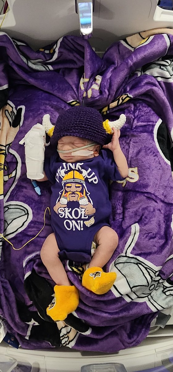 jcoubal's tweet photo. First Vikings game ever, big but little fan. #NICU #childrenshospital #52daysold @Vikings @SweatyCuh #SKOL https://t.co/MRMgmeiCkg