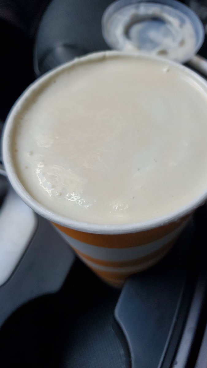 Wunmex's tweet photo. @mcd_canada 

This was meant to be a Thripple Thick Milkshake, even when i brought it to the staff attention how watery it is, they blame the machine, this is a fraud on your part, if you can't deliver on thripple tick, don't advertise it simple. https://t.co/Gzr2blFBwd