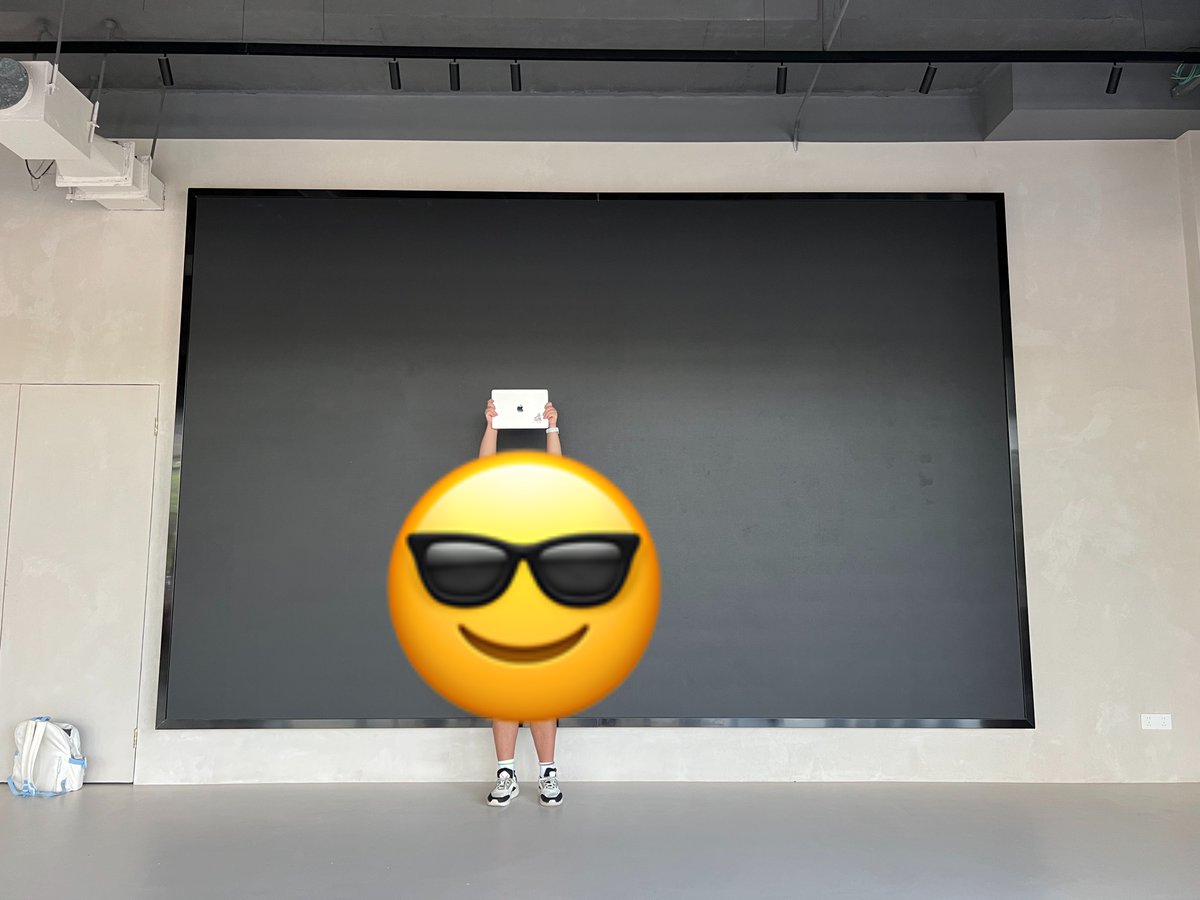 tutu_studio's tweet photo. We're excited to host an Apple Event watch party in Hangzhou, China! Check out our venue, where a 14-inch MacBook Pro looks tiny next to our massive screen. Can't wait for the big reveal! https://t.co/a55C6pJMjn