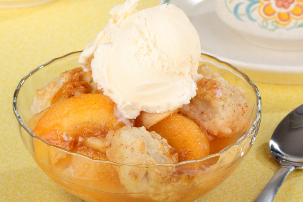 This is the answer: Old-fashioned peach cobbler.

Read the full article: Old Fashioned Peach Cobbler
▸ lttr.ai/AGr1O

#LargeMixingBowl #SeparateMixingBowl #ClassicAmericanDessert #VanillaIceCream #DelightfulSummerDessert #OldFashionedPeachCobbler