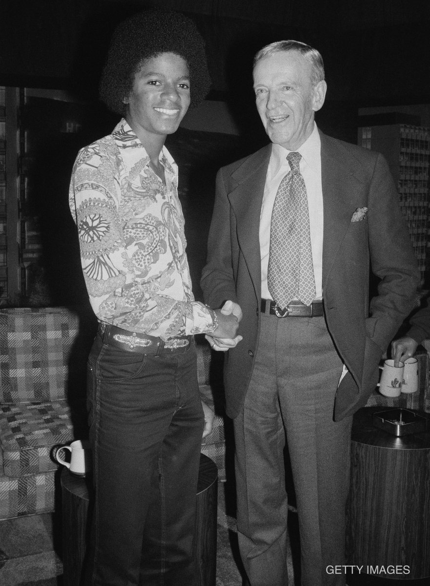 michaeljackson's tweet photo. Michael meeting actor and legendary dancer Fred Astaire in 1975. Years later, Astaire told Michael of his Motown 25 anniversary appearance where he debuted his “Moonwalk” dance: “You’re a hell of a mover." Michael says it was the greatest compliment he ever received. https://t.co/0V2SkWZEmk