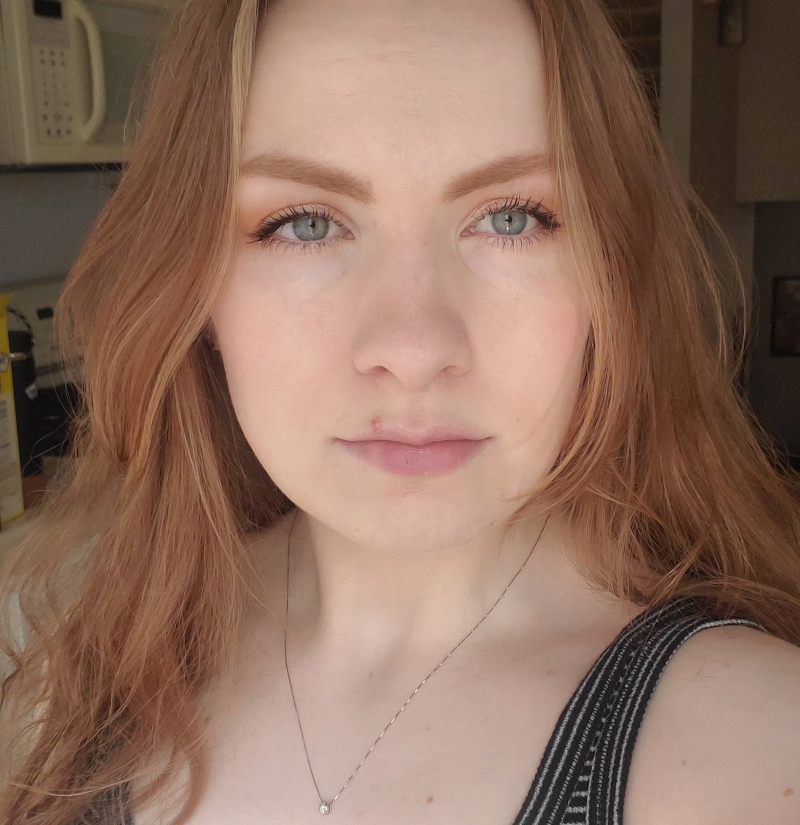 I've always looked the same, my hair just changes sometimes. Probably a 12 year difference here approximately.