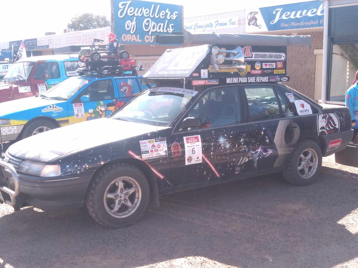 CapitalOpal's tweet photo. Bringing you the grand finale of the Variety Bash car parade in Coober Pedy! 🚗🎉 These colorful cars lit up our streets and hearts. Thanks for the smiles and the support for a great cause! 🌟 #VarietyBash #CooberPedy #CarParade #CommunitySpirit https://t.co/edh6dGceQG
