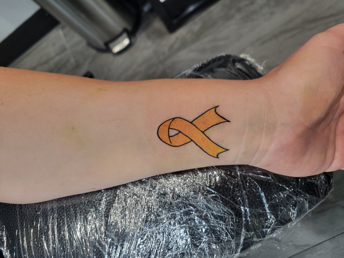 Suicide Prevention is  important to my family. The yellow ribbon means it's OK to ask for help.  @InnrViznsTattoo partnered with @AFSPNevada to raise money today. I now have a permanent statement to others that it's OK to ask for help! #SuicidePreventionDay