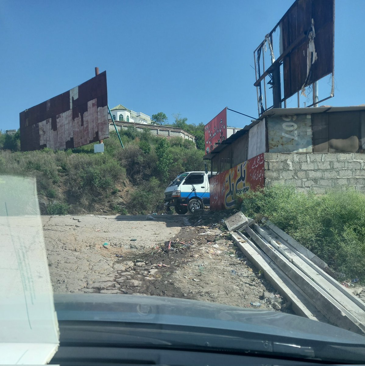 alikhansays_'s tweet photo. @aneelsaeed @dcislamabad @CDAthecapital Urgent repair of this old angori road (110 bys stop) in 17 meel is required. Inconvenience is faced by daily commuters. Proper asphalt road seems to be the only viable solution... Please look into this and resolve. Exact location attached. https://t.co/t6bpv7Ph4g