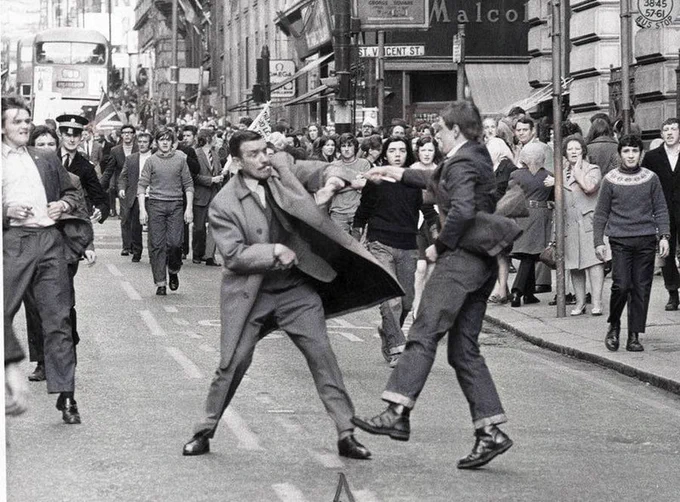 OldGlasgow.com Detective Inspector George Johnstone being attacked by a youth with an open razor in Renfield Street, Glasgow 1971 OldGlasgow.com