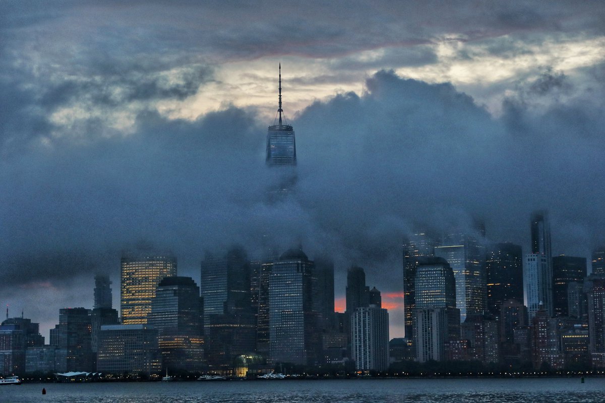 One World Trade Center rises through fog as the sunrises on the 22nd anniversary of the 9/11 attacks in New York City, Monday morning #newyork 
#newyorkcity #NYC #sunrise  #neverforget <a href="/agreatbigcity/">A Great Big City</a>