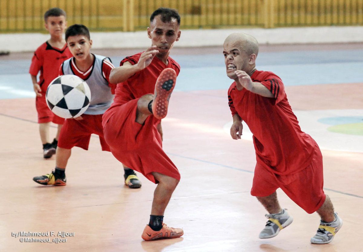 QudsNen's tweet photo. Palestinian athletes from a short-statured football team undergo football training at the Saad Sayel Stadium in #Gaza City in preparation for participation in tournaments abroad.

📷 Mahmoud Ajjur https://t.co/oquFRLNr8X