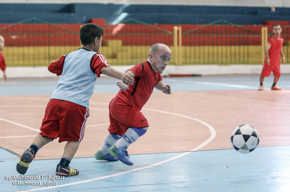 QudsNen's tweet photo. Palestinian athletes from a short-statured football team undergo football training at the Saad Sayel Stadium in #Gaza City in preparation for participation in tournaments abroad.

📷 Mahmoud Ajjur https://t.co/oquFRLNr8X