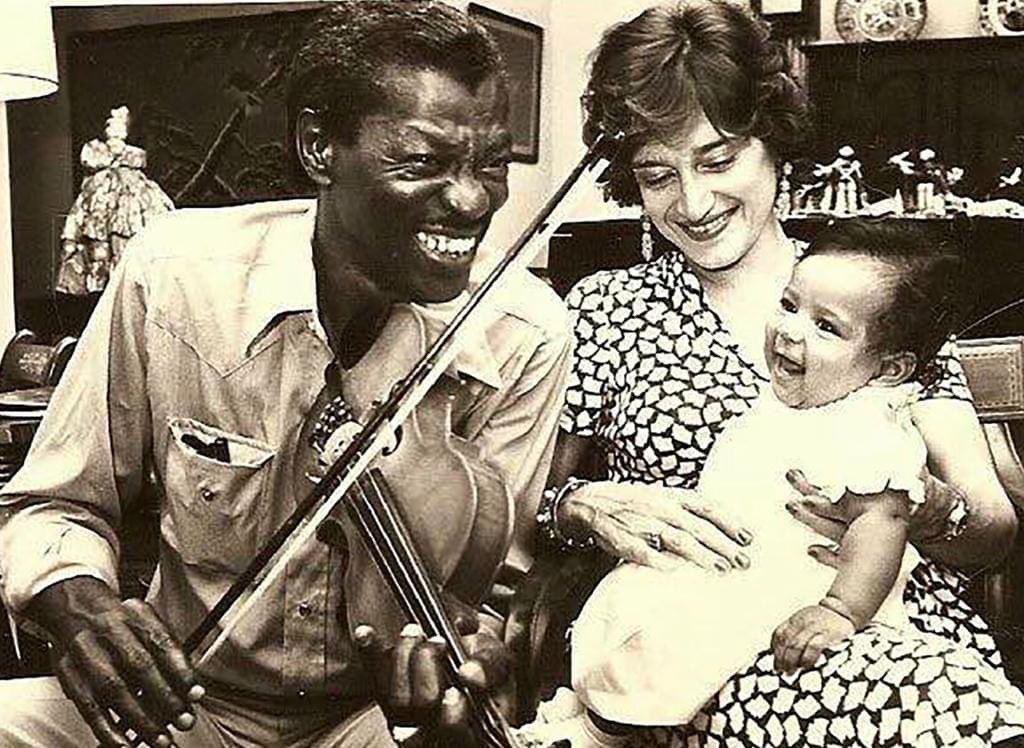Bluesman Clarence 'Gatemouth' Brown with Yvonne Brown and their daughter, Renée, before they left to accompany him in his official role as 'Music Ambassador' for a U.S. State Department tour of Europe in 1979.