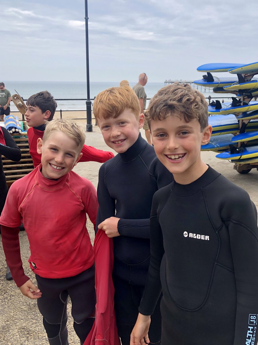 AysgarthSchool's tweet photo. Saltburn Surfing: Riding the Waves, Laughter, and New Friends! Form 1 had a swell time with Mr. and Mrs. Anderson. Some boys even managed some fin-tastic tricks. 🌊 #Surfinglessons #aysgarthactivities #iloveboarding https://t.co/8RFrYgDshy
