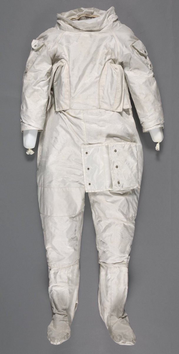 spacesuitmaster's tweet photo. ILC Industries' AX-1L cover layer for a revamped SPD-143 suit. Tailored to explore rubber/neoprene joints and air connectors, it skips integrated boots but pioneers strap tech and uses Apollo-approved materials. #spacesuit #NASA #Apollo #ILC #smithsonian https://t.co/ZZCLJInjYT