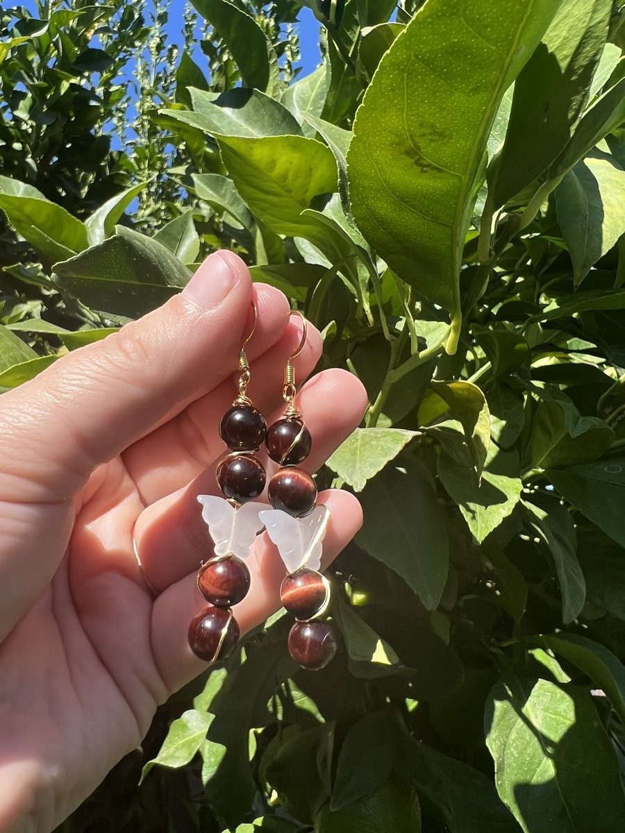 cute lil red tigers eye X butterfly earrings ❣️ dm to claim!