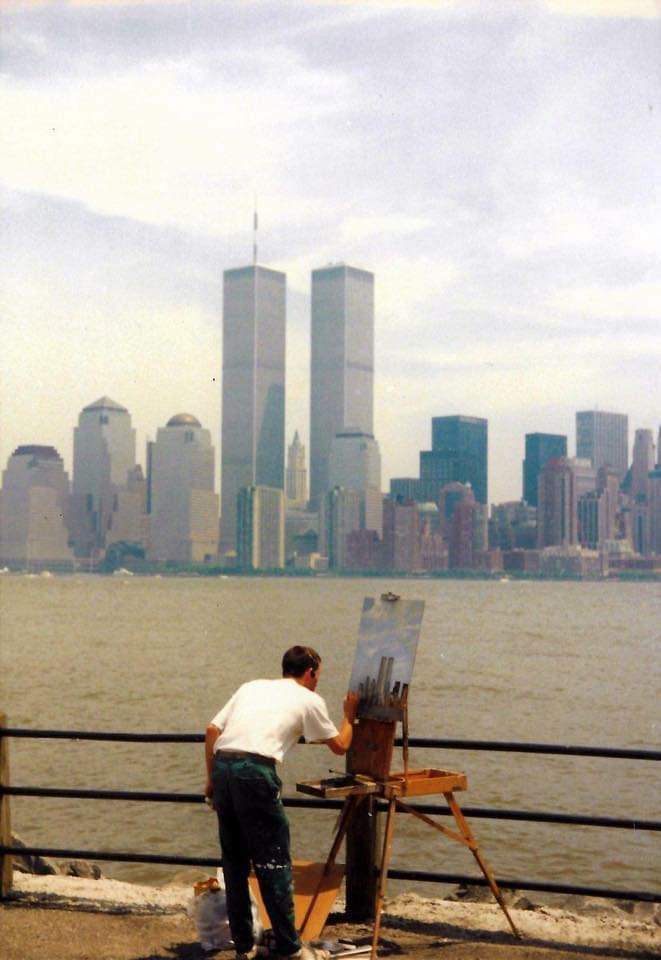 A man photographed while painting the Twin Towers sometime during the 1980s. #September11th #911NeverForget